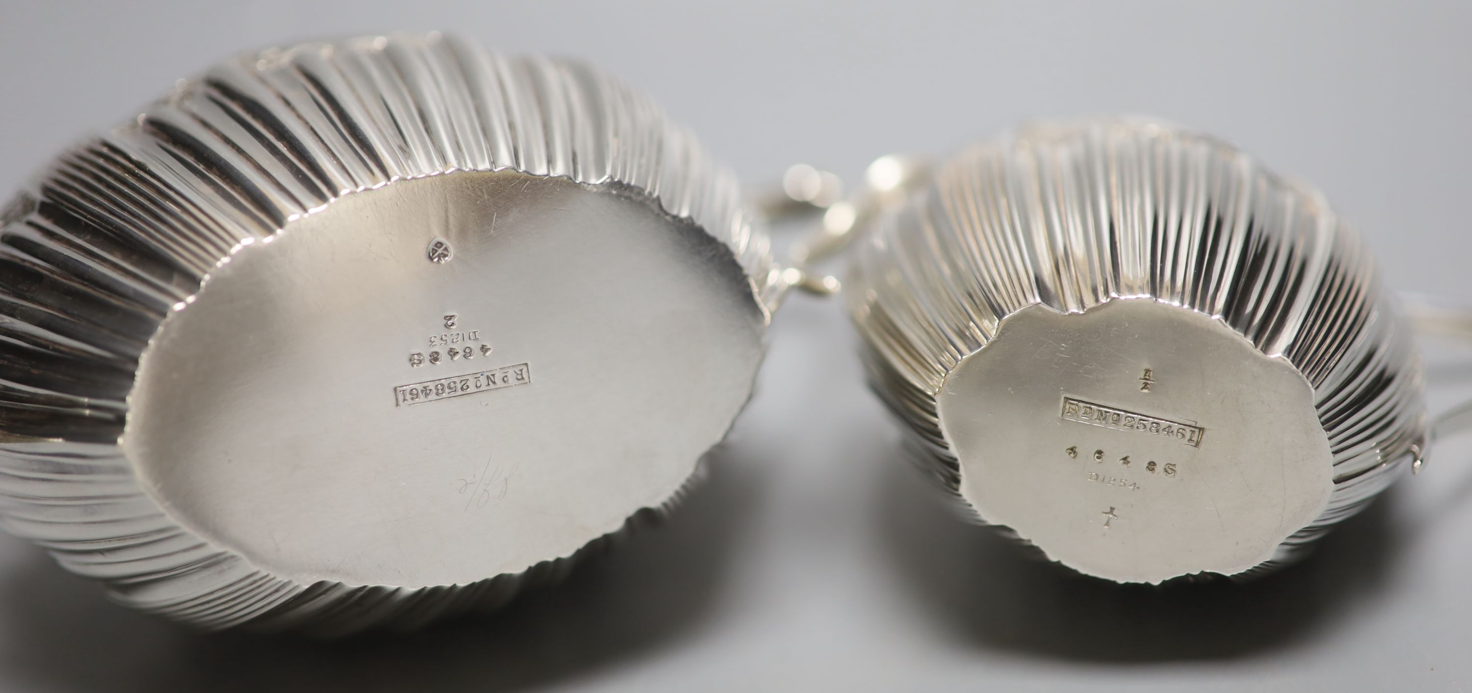 A late Victorian embossed silver sugar bowl and cream jug, James Dixon & Sons, Sheffield, 1896/7,